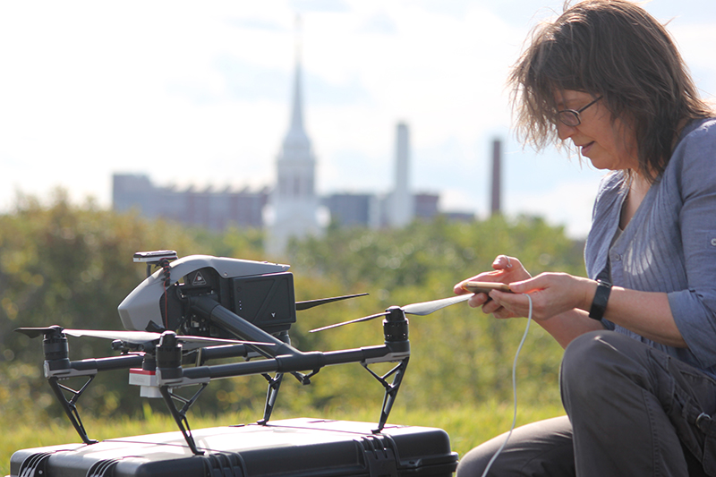 UConn Online Remote Sensing Graduate Certificate, PHd student collecting data from drone
